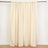 Beige fabric curtains hanging on a rod against a plain background.