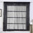Black sheer window curtain drapes for a stylish, modern look.