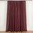 Burgundy sheer curtain with gathered top, perfect for adding elegance to any room.