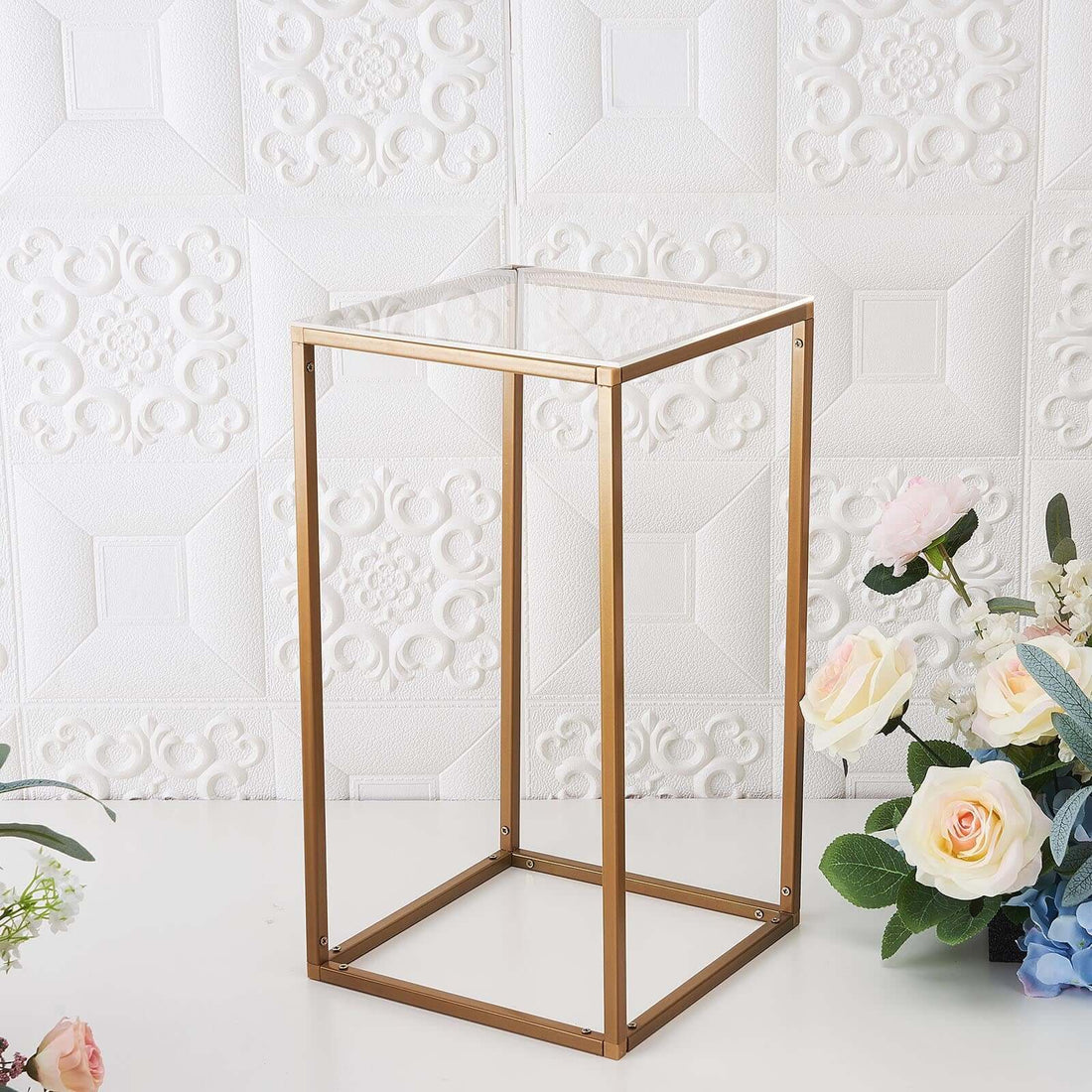 Gold metal and glass side table with floral decor