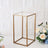 Gold metal and glass side table with floral decor