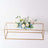 Gold geometric vase with artificial flowers