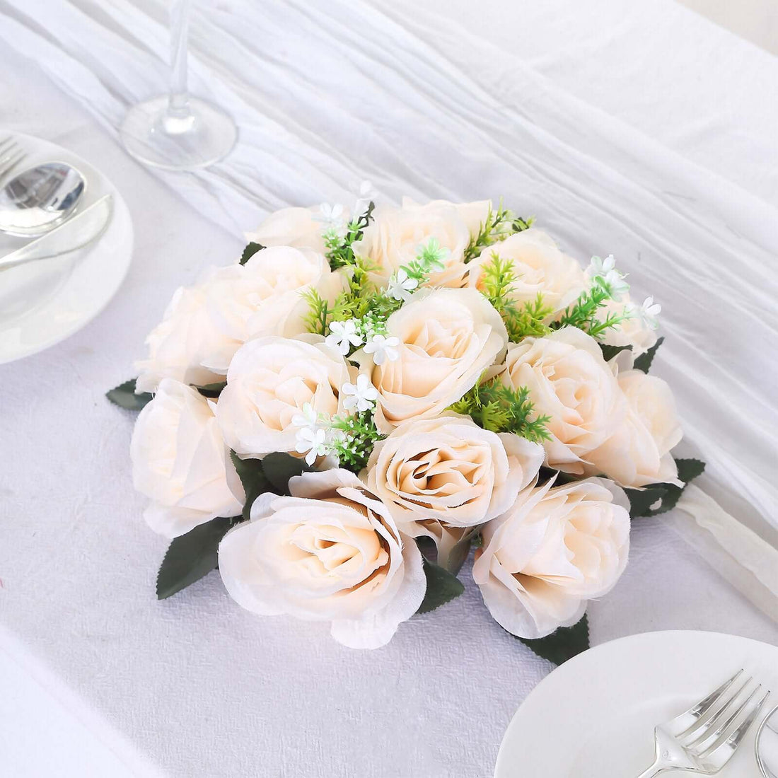 Artificial cream roses bouquet for table decoration.