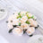Artificial cream roses bouquet for table decoration.
