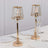 Elegant gold table lamps with crystal accents on a dining table setting.