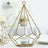 Gold geometric candle holder with glass tealight holder