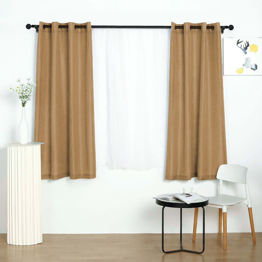 Brown curtains on a rod with a white sheer curtain in a modern living space.