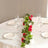 Elegant table setting with roses and glassware for a special occasion.