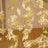 White flower string lights with warm glow on a soft background.