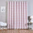 Pink and white chevron patterned curtain in a stylish room setting.