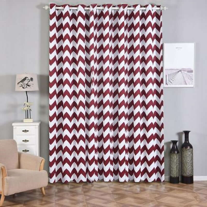Chevron pattern curtains in a stylish living room setting.