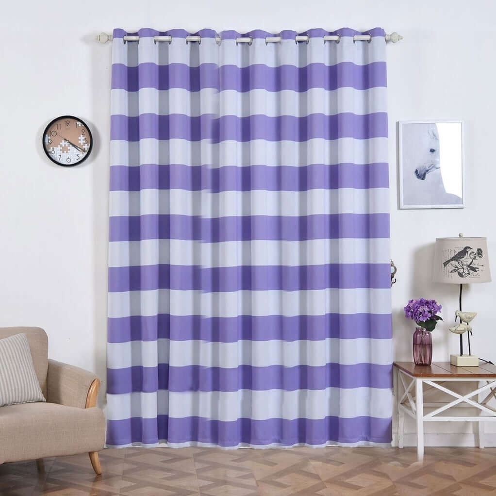 Purple striped curtains hanging in a stylish living room setting.