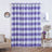 Purple striped curtains hanging in a stylish living room setting.