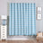 Blue chevron patterned curtain in a styled living room setting.