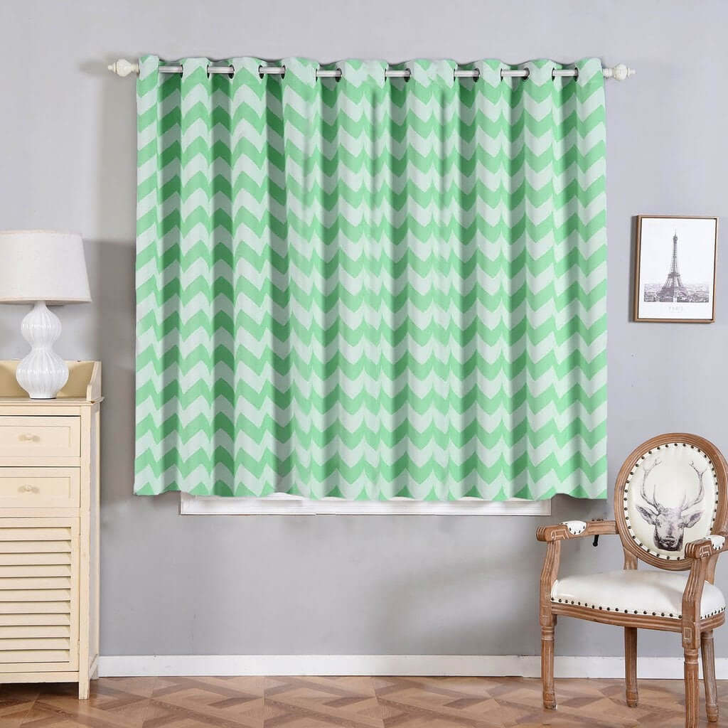 Chevron pattern mint green curtain hanging in a stylish room.