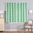 Chevron pattern mint green curtain hanging in a stylish room.
