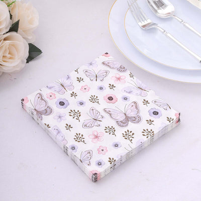 Floral butterfly paper napkins stacked on a table