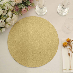 Gold glitter round placemat on a table setting with floral accents.