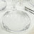 Elegant clear glass plate with silver ornate rim design.