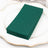 Stack of green cardstock sheets on a decorative plate