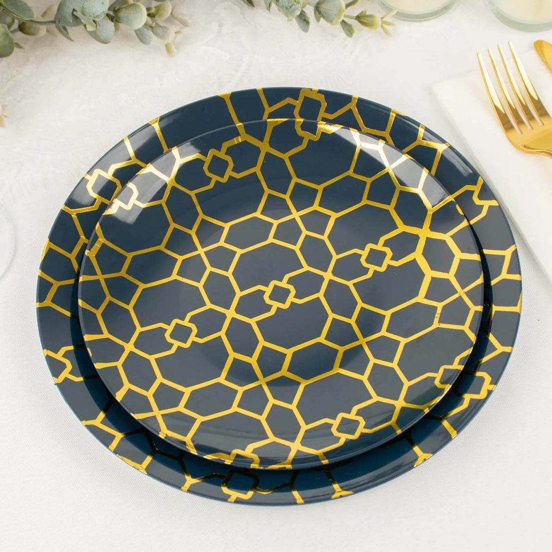 Navy blue decorative plates with gold geometric pattern