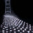 LED string lights on a dark background, creating a sparkling effect.