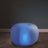 Illuminated blue pouf for modern decor and comfortable seating.
