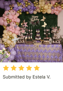 Happy birthday cake table decor with tablecloth, cake stands, dessert stands, butterflies, balloons, & greenery backdrop by Estela V