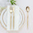 Elegant gold cutlery set on a decorative table setting.