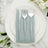 Elegant silver cutlery set on a soft blue napkin atop a white plate.