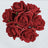 Red artificial rose bouquet on a white background.