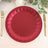 Red paper plate with scalloped edges, set on a table with gold utensils.