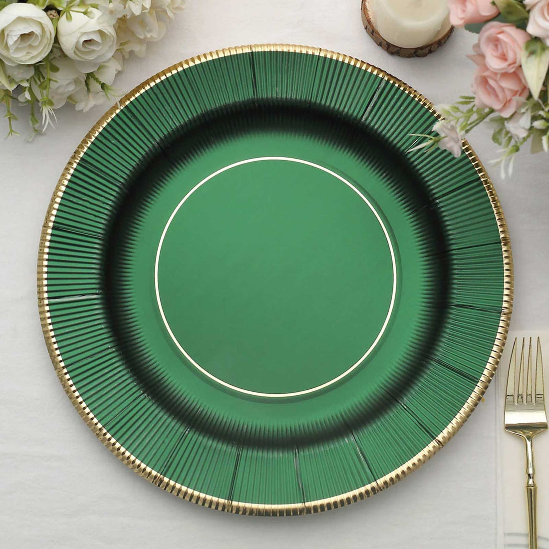 Green decorative plate with gold rim and textured design.