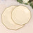 Elegant cream plates with gold trim, set of two, perfect for special occasions.