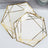 Geometric decorative plates with gold accents on a white background