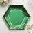Green hexagonal plate with gold geometric accents on a table setting.