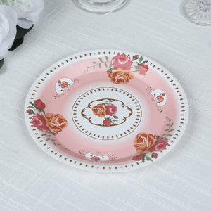 Decorative pink plate with floral design and elegant gold accents