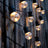 String lights hanging on a wooden fence at dusk, creating a warm ambiance.