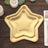 Set of gold star-shaped plates for festive occasions.