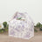 Decorative floral gift box with a handle and cutout design.