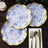Blue floral design paper plates with gold rim, set of three.