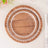 Wooden plates with white lace design on a neutral background.