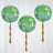 Colorful marbled balloons with gold tassels hanging against a white backdrop.