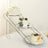 Three-tier cake stand with decorated cakes in elegant presentation.