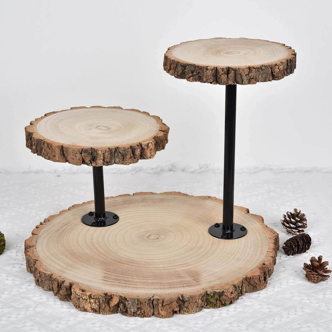 Wooden cake stand with rustic design and black metal supports