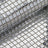 Silver mosaic tile sheet with reflective surface and intricate pattern.