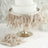 Elegant beige feather cake wrap for decorative cakes.