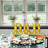 Yellow marquee letters spelling "DAD" displayed above a dessert table.