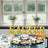 Easter marquee sign with decorated desserts in a festive setting.