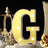 Light-up letter "G" marquee sign with bulbs, stylish decor piece.
